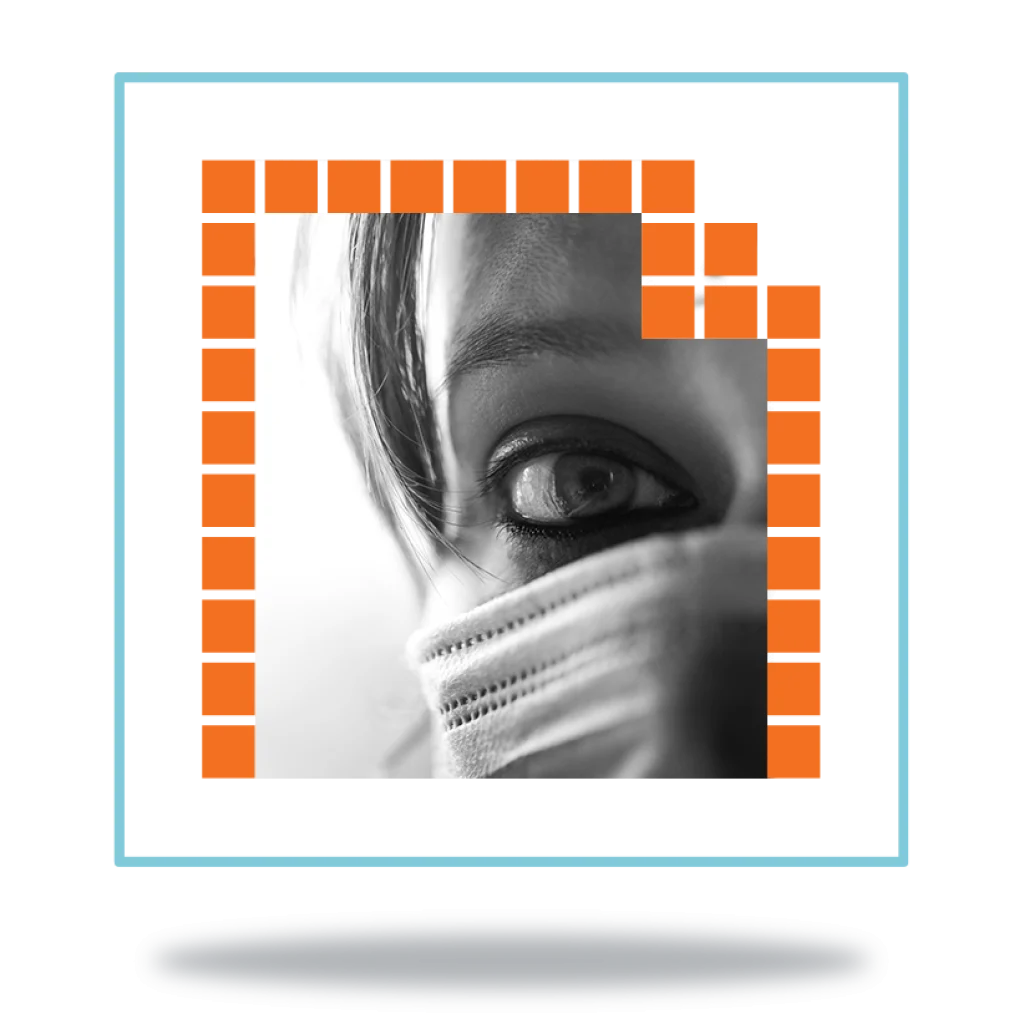 close up of a masked nurse with concerned look in her eye