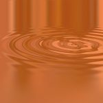 ripples in the water from a water droplet