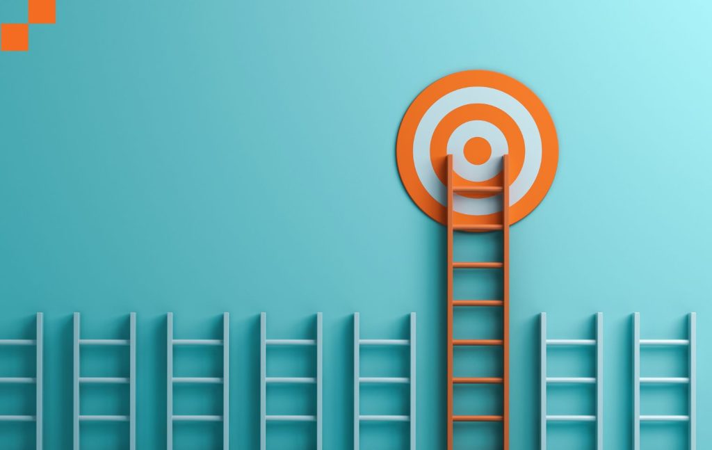 Four blue ladders and one orange ladder tall enough to reach the bullseye target