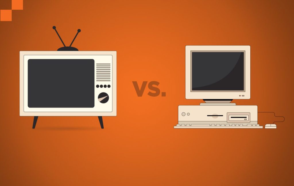 Image of a television and a computer next to each other